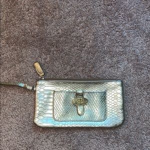 Sharif gold metallic wristlet
